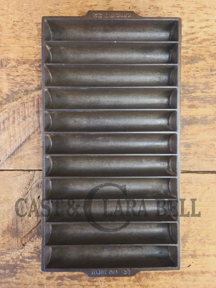 WOW very cool. Raised Erie No. 22 Breadstick Pan. Early 1900’s No. 22 Corn Bread Pan 11 cup 954 - Bakeware