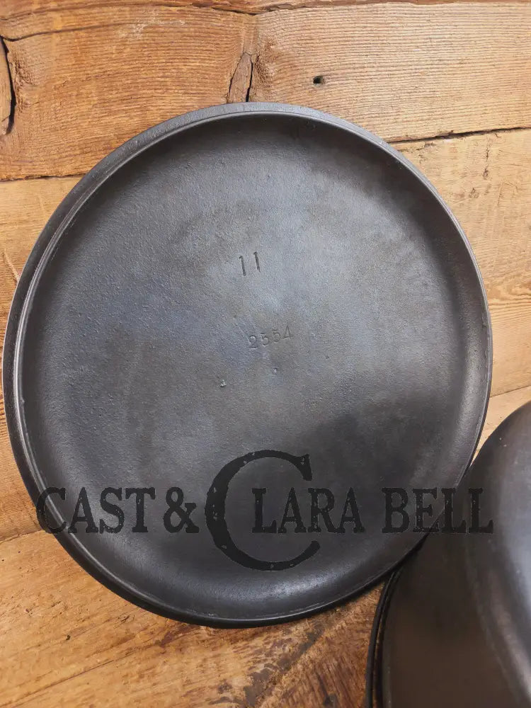 WOW. Very rare 1910’s Griswold Size #11 (834) Dutch Oven with Slant Logo and (2554) Lid. One you don’t see often. Dutch