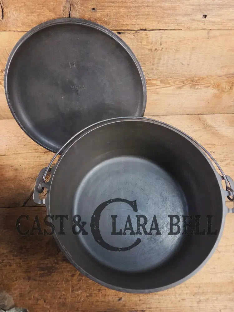 WOW. Very rare 1910’s Griswold Size #11 (834) Dutch Oven with Slant Logo and (2554) Lid. One you don’t see often. Dutch