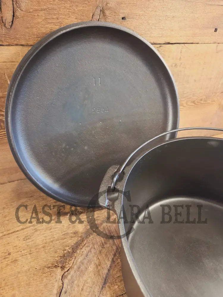 WOW. Very rare 1910’s Griswold Size #11 Dutch Oven with Slant Logo and (2554) Lid. One you don’t see often - Dutch